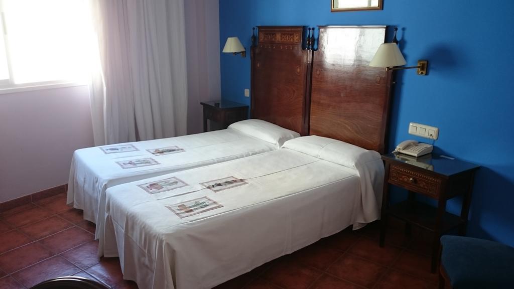 Hotel Iberia Plaza America Caces Oda fotoğraf